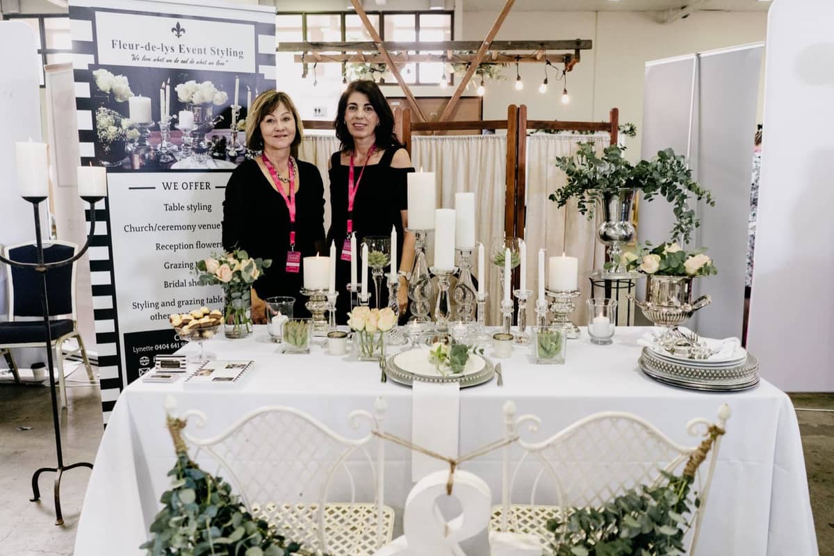 Visitors talking with exhibitors at a Wedding Expos Australia event