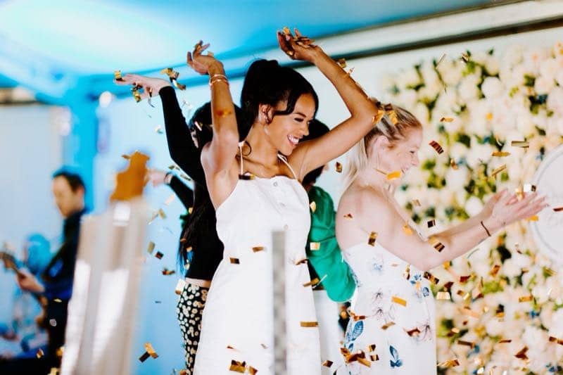 Couples browsing stands at a wedding expo